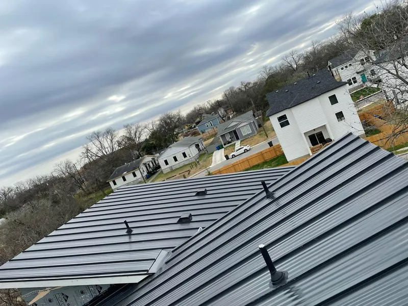 Standing seam metal roof panels with vents for Skylight Repair in Perryton